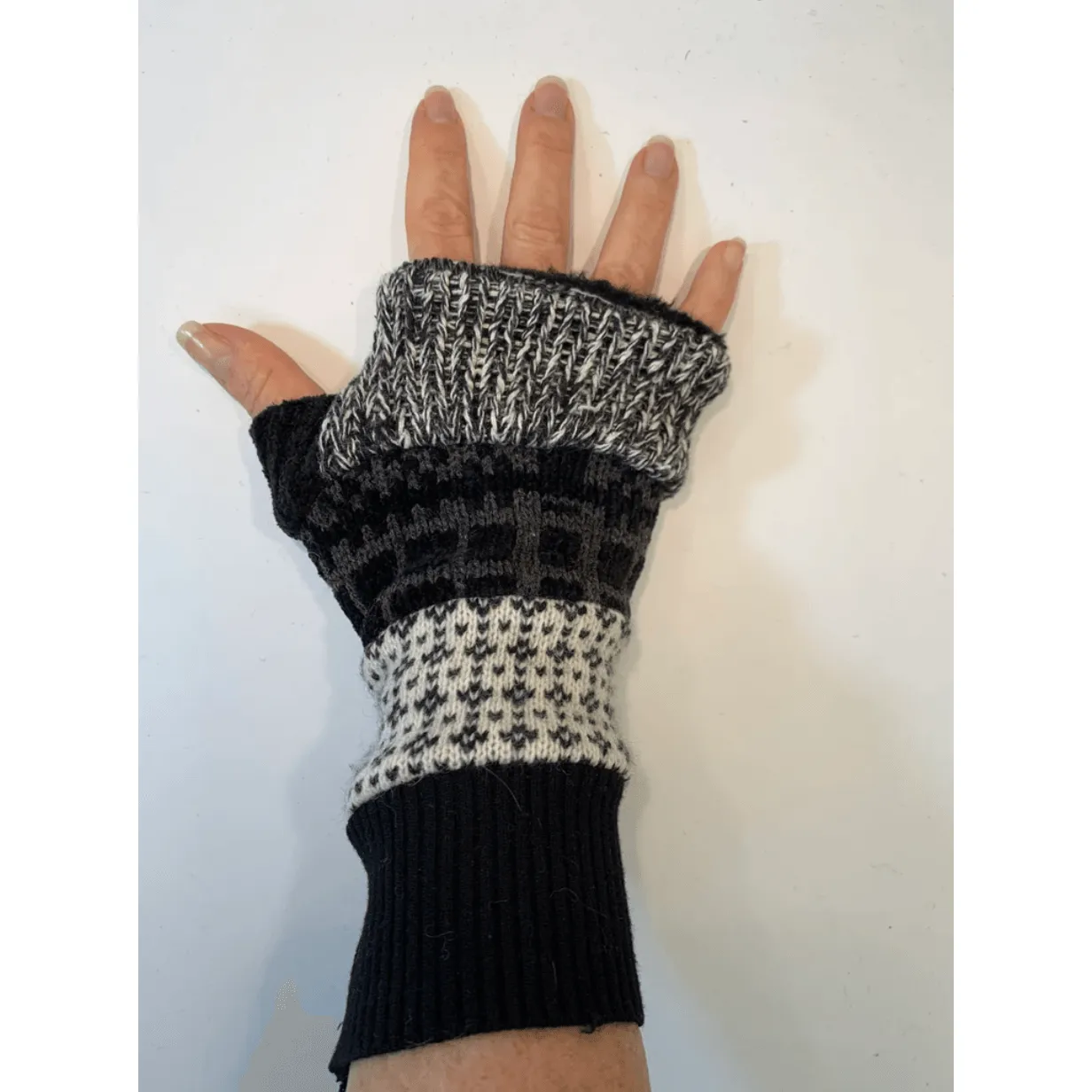 Black n white upcycled sweaters into fingerless patchwork gloves. Great for fun, school, texting, cashiers, wrist warmer,fingers free.