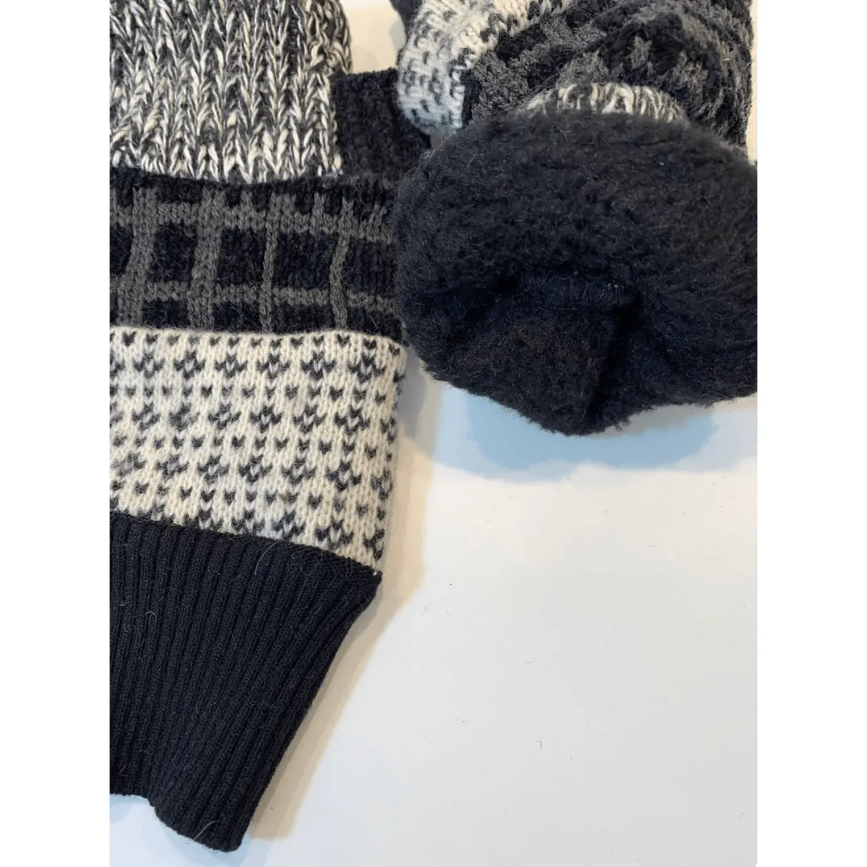 Black n white upcycled sweaters into fingerless patchwork gloves. Great for fun, school, texting, cashiers, wrist warmer,fingers free.